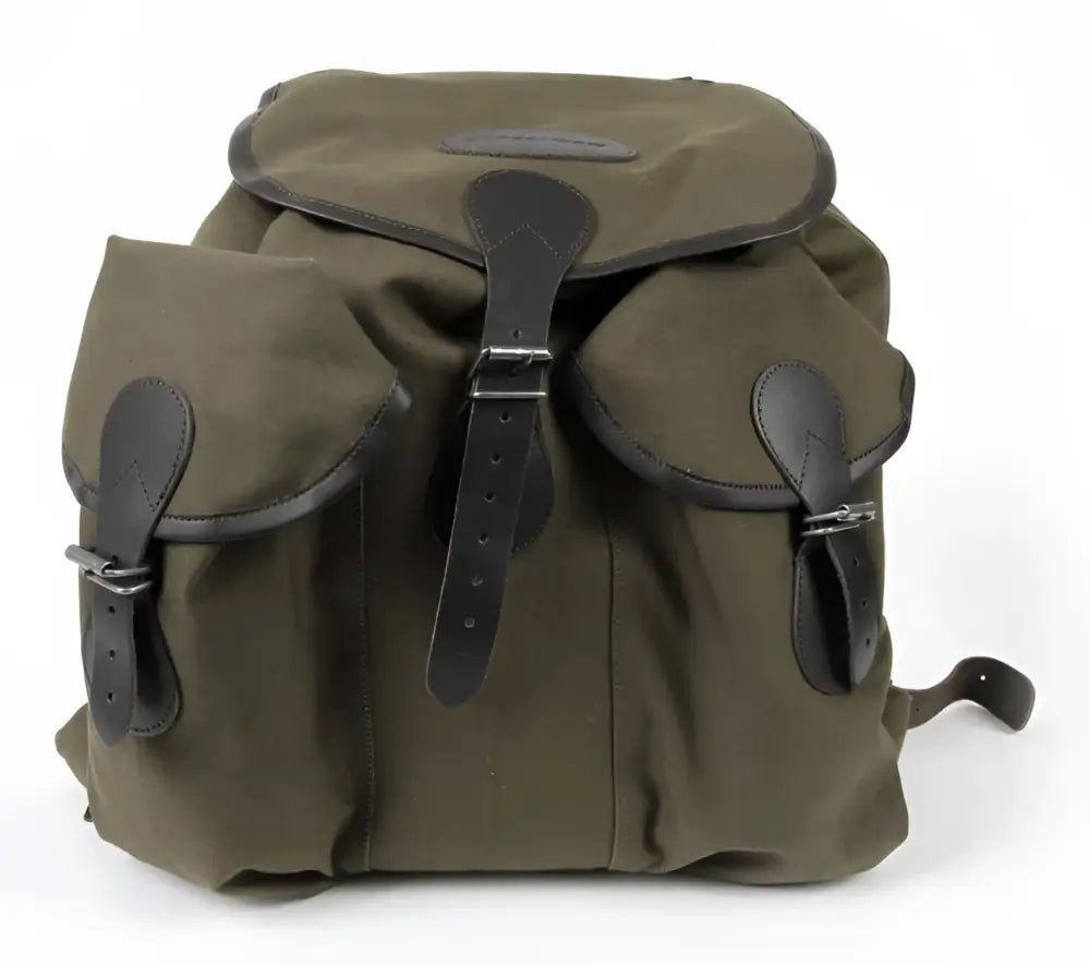 Olive green canvas backpack bear claw jätkän reppu with black leather straps and buckles for durable use