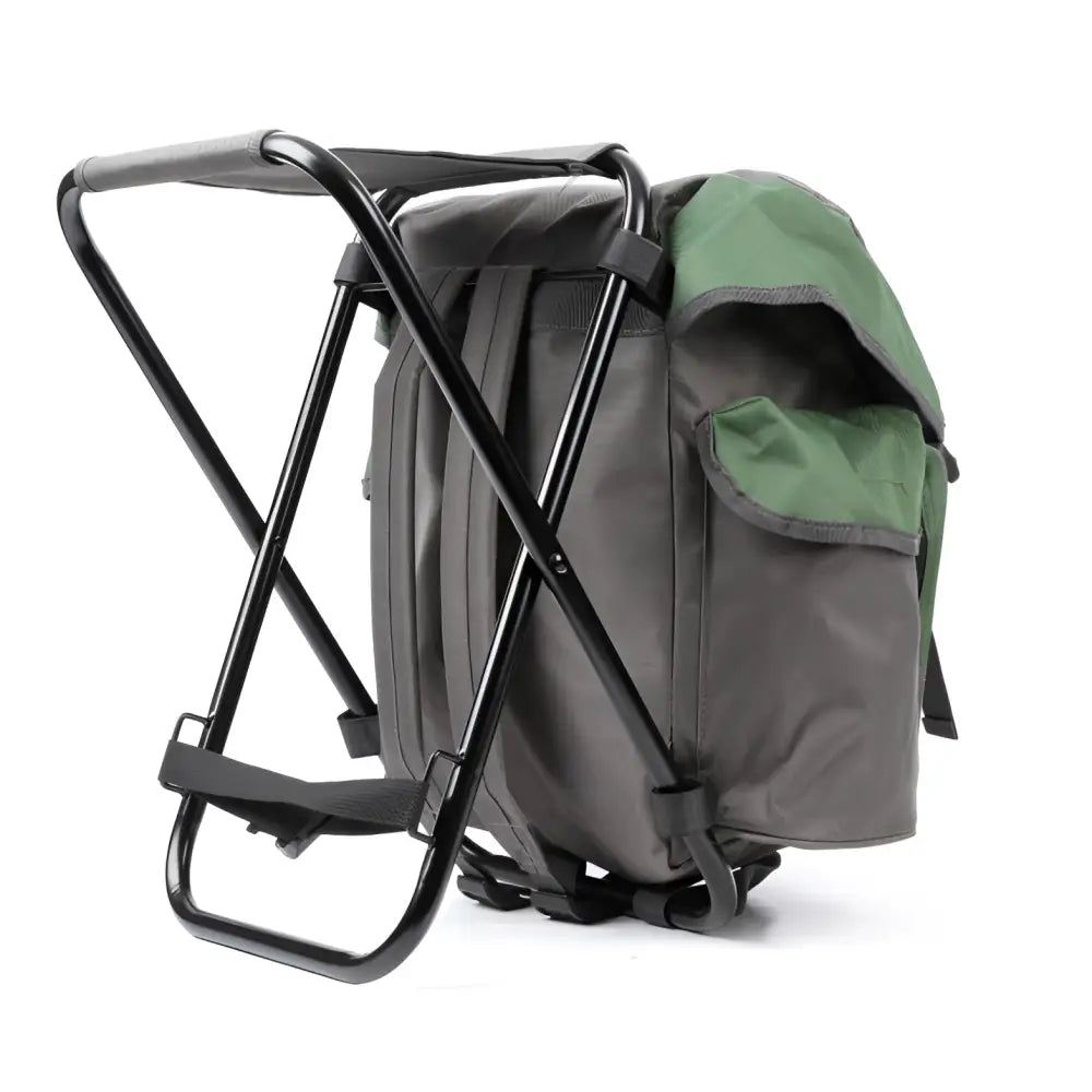 A compact foldable camping chair with black metal frame gray fabric and green side pocket from Haghus Stol Bag reppujakkara 35L