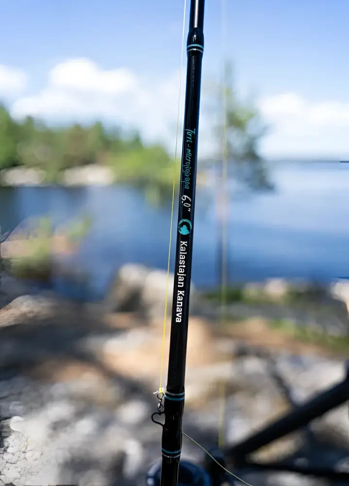 Black fishing rod kalastajan kanava tirri micro 183cm 0.9-8.5g with teal accents and karasjokan kanaava 6.0 length