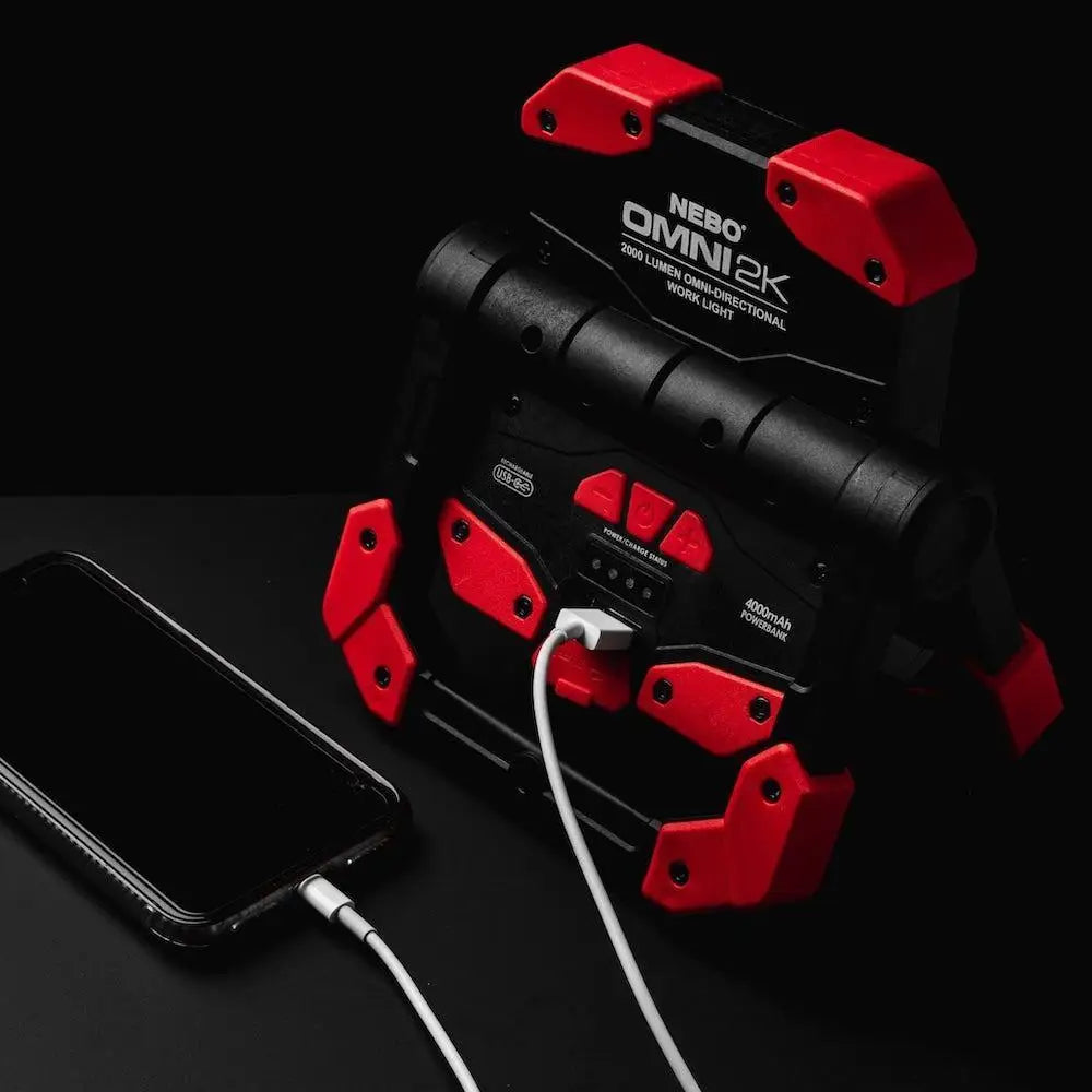 Red and black Nebo Omni2K 2000 lumen omnidirectional work light with rugged angular design for durable use