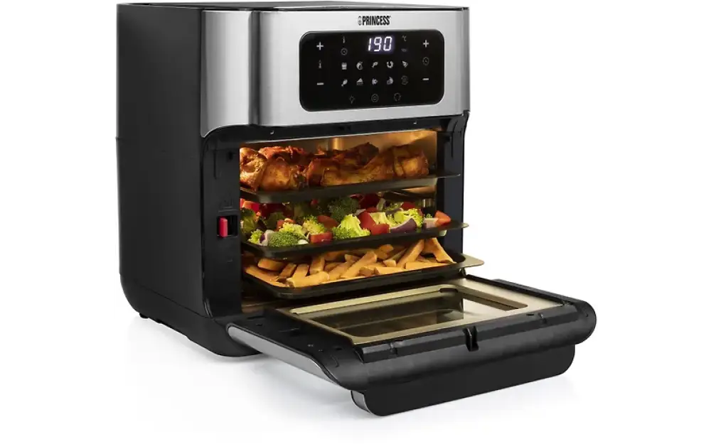 Black and silver princess aerofryer oven airfryer miniuuni with digital display at 190 degrees and three trays of cooked food