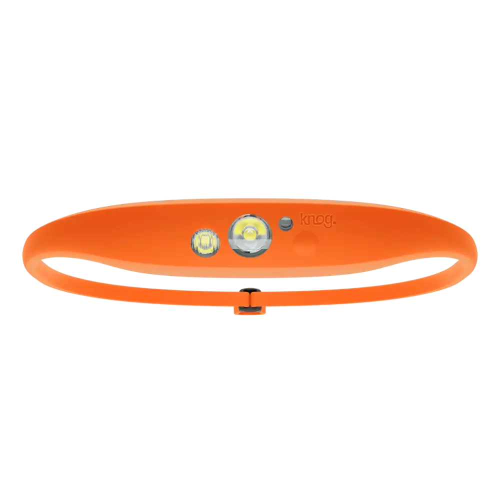 Bright orange knog quokka 150 headlamp with sleek flexible silicone band and two distinct light modules
