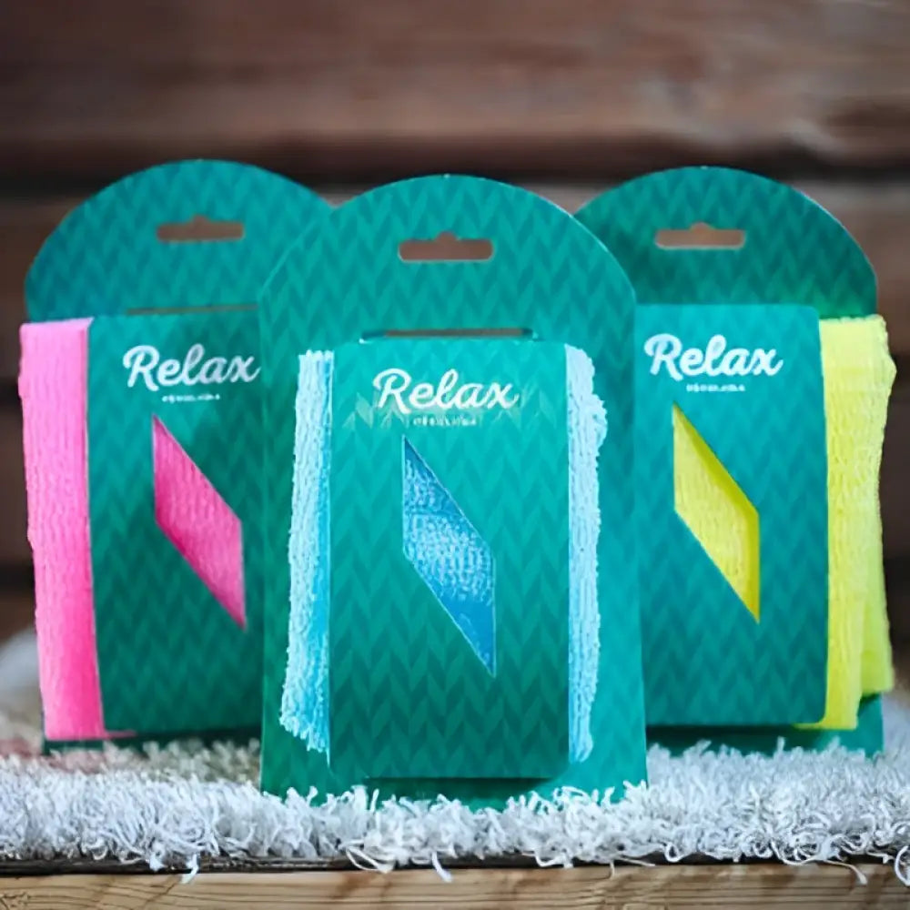Relax-pesuliina teal-pakkauksessa pinkkeinä, sinisinä ja keltaisina mikrokuituliinoina tehokkaaseen puhdistukseen