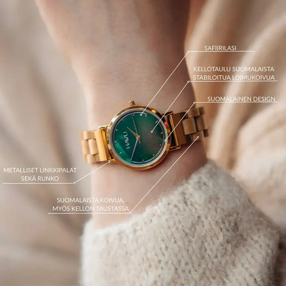 Gold-toned revontuli koivu 32mm watch with vibrant green sapphire dial and matching metal link bracelet featuring Finnish design