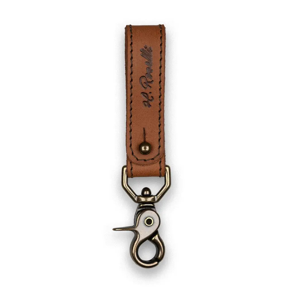 Tan nahkainen roselli belt loop avainnauha hopeanvärisellä metallikoukulla ja r-brändin nimellä