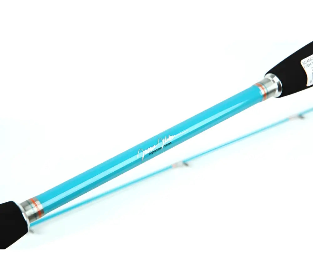 A sleek bright turquoise fishing rod with black ergonomic grips and silver accents scandinavian tackle fish me luck perch 210cm