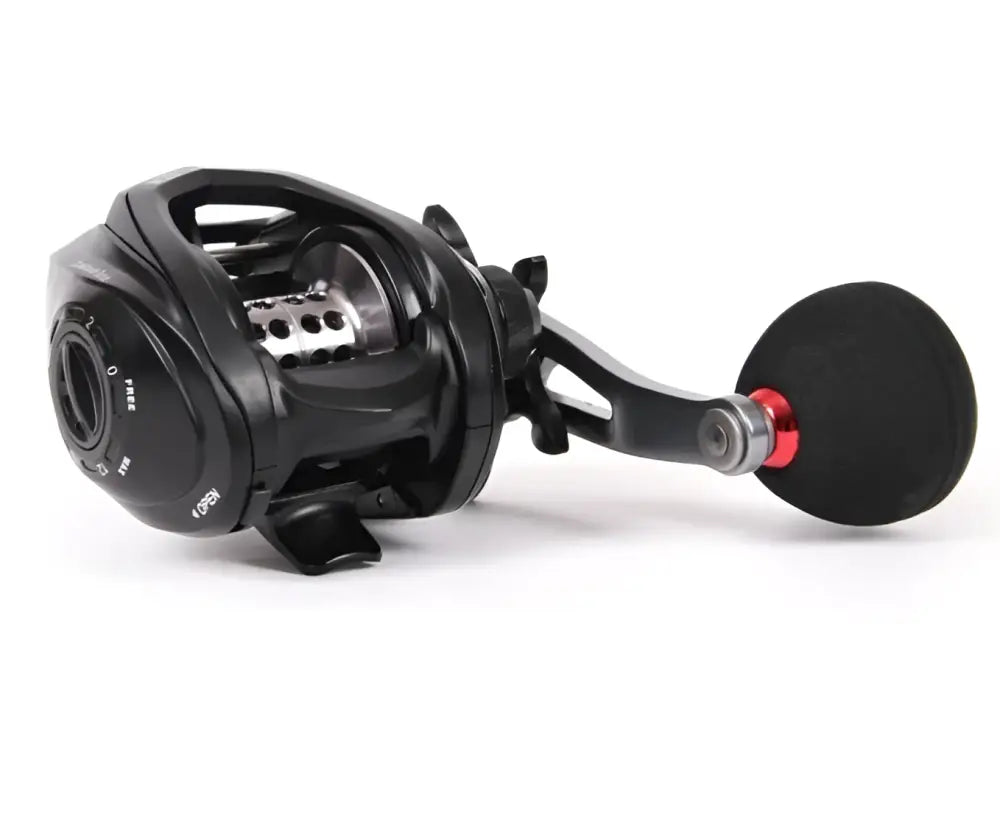 Black and red Scandinavian Tackle M23 hyrräkela baitcasting reel with textured grip handle for precise fishing