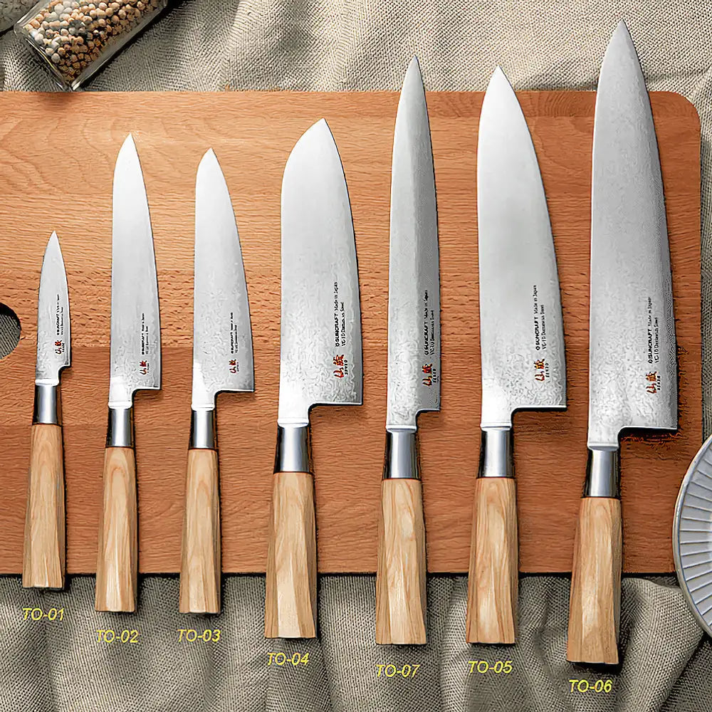 Setti seitsemästä suncraft senzo damascus twisted octagon santoku 17 cm kokkiveistä puukahvoilla ja damaskon terällä