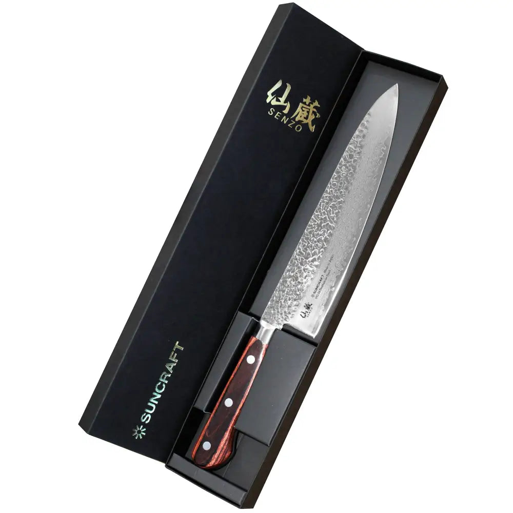 Sleek damascus steel kokkiveitsi with polished blade and brown wooden handle in elegant black senzo box by suncraft