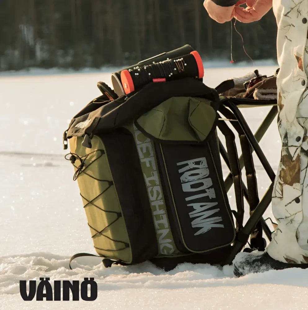 Backside of olive green and black Väinö Tank 50l pilkkireppu with reinforced straps and bold white logo for rugged use
