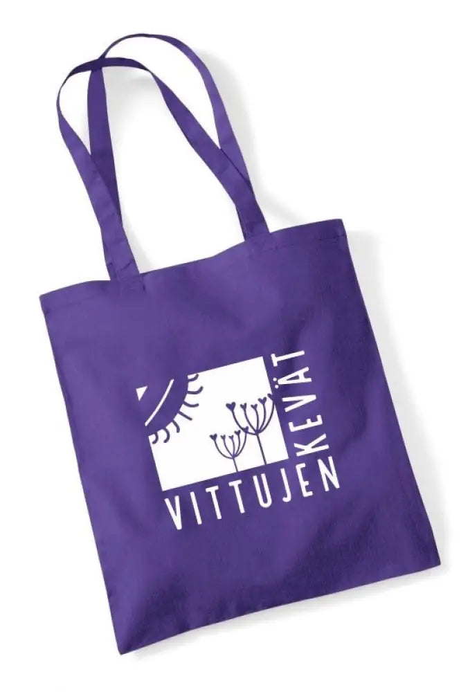 Violetti kangaskassi valkoisella vittujen kevät -tekstillä ja tyylitellyillä kasvi-kuvioilla Vittujen kevät logolla